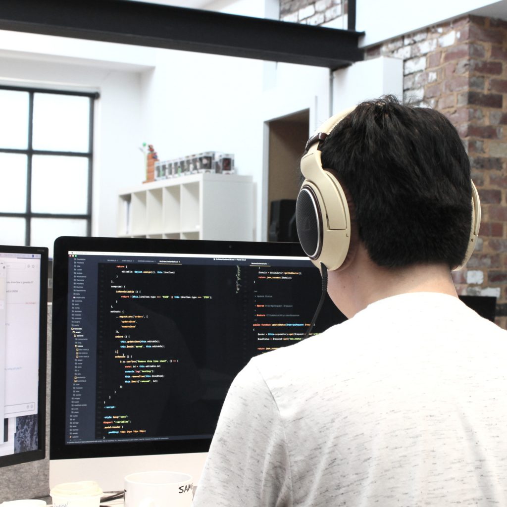 man in front of computer